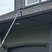 Gutter vacuum working from the ground